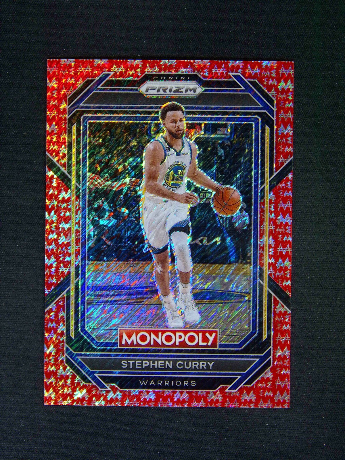 2023-24 Panini Prizm Stephen Curry #28 Monopoly Red Millionaire Shimmer /100