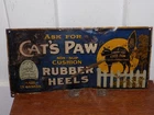 Vintage Cat’s Paw Rubber Heels Tin Sign