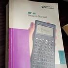 Hewlett Packard HP 48 Scientific Calculator LCD, Handheld Battery w/ Case Manual — photo 3