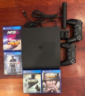 Sony PS 4 Slim 500GB with 2 Controllers, Camera & 4 Games