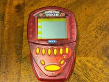 2000 Radica Electronic Handheld Triple Play Poker Travel Card Game. Working