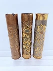 LOT OF 3: EARLY 1900’s ATQ EMBOSSED FLORAL DECO AMMO SHELLS