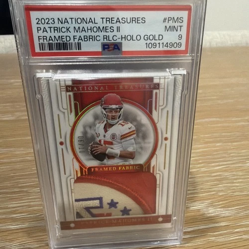 2023 National Treasures Patrick Mahomes Framed Fabric Holo Gold 06/10 PSA 9