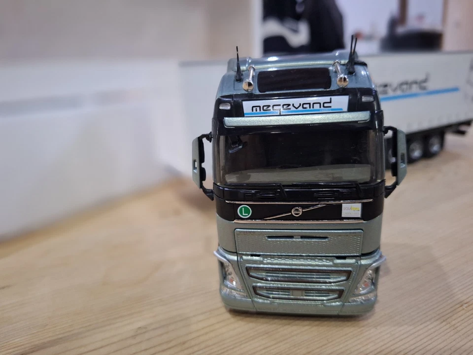 CAMION ELIGOR 1/43 VOLVO FH 4 GLOBETROTTER SEMI TAUTLINER MEGEVAND FRERES 115501 - Photo 2/4