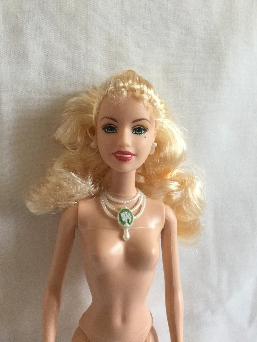 Barbie con sales la pancia