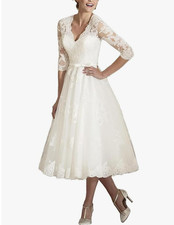 Beautiful Formal White Lace-up Wedding Dress - new with tags - size 16W