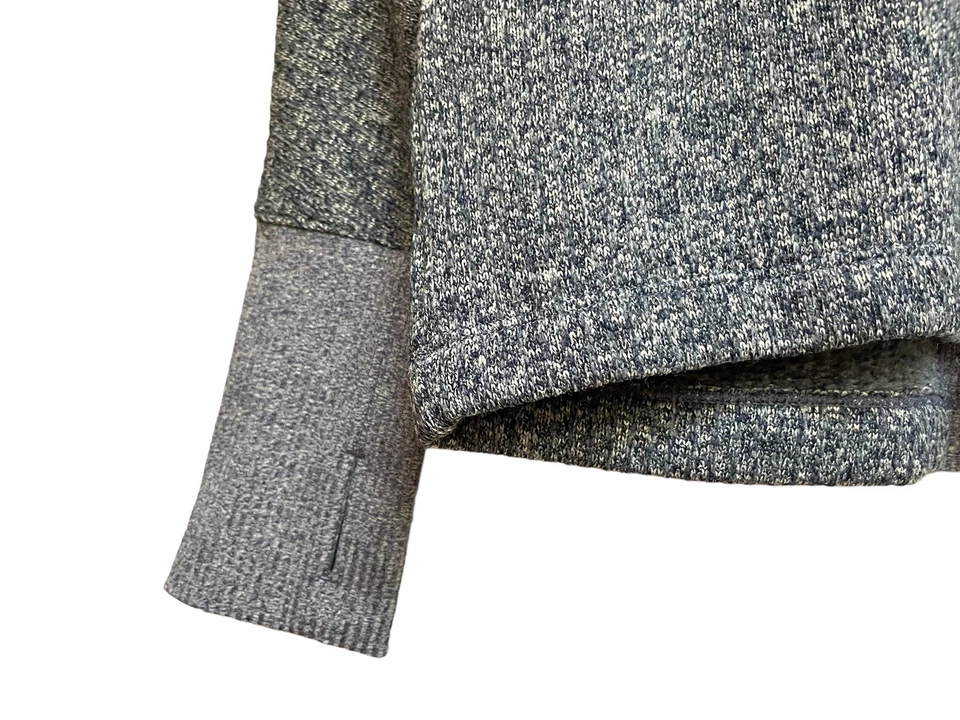 Pullover deportivo con aberturas para pulgar Asics de cuello alto de manga larga forrado de lana para mujer Foto 4 de 4