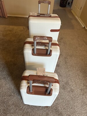 suitcase with wheels large brand new in the box.