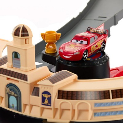 Disney Pixar Cars HXJ33 NASCAR Lane Change Race Playset with 2 Toy