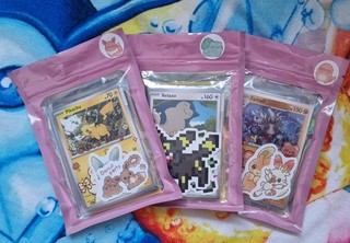 3x Pokémon Mystery Packs/Booster mit garantierten Hits & mehr
