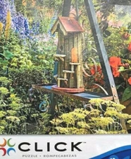 Teeter Garden COMP 1000 pc Puzzle 27x19 Garden of Flowers Balanced Bird House