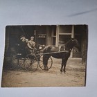 Vintage Real Photo Postcard Horse and Carriage Cowboy Street Scene Hat Store — photo 1