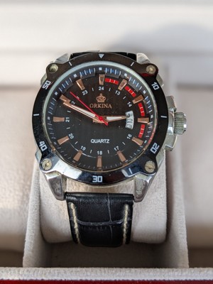 ORKINA Herrenuhr, Guter Zustand, Lederarmband, neue Batterie