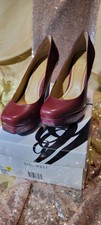 Women's Nine West marron 5 inch heel pumps in size 6.5