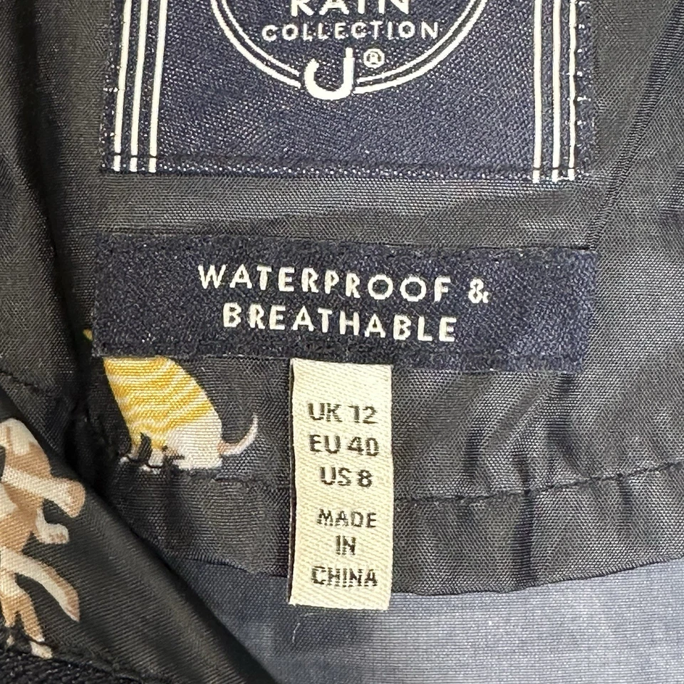 Chaqueta de lluvia con capucha con estampado de perro Joules Right As Rain 12 azul marino cremallera completa para mujer Foto 3 de 4