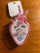 New Lot of 7 Rings in Strawberry Plastic Case from Claire's Club