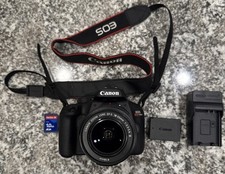 Canon EOS Rebel T100 DSLR Camera with EF-S 18-55mm f/3.5-5.6 Lens Tested Working