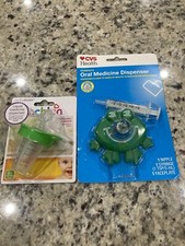 2 Medicine Dispensers For Infants New And Sealed One Frog One Regular