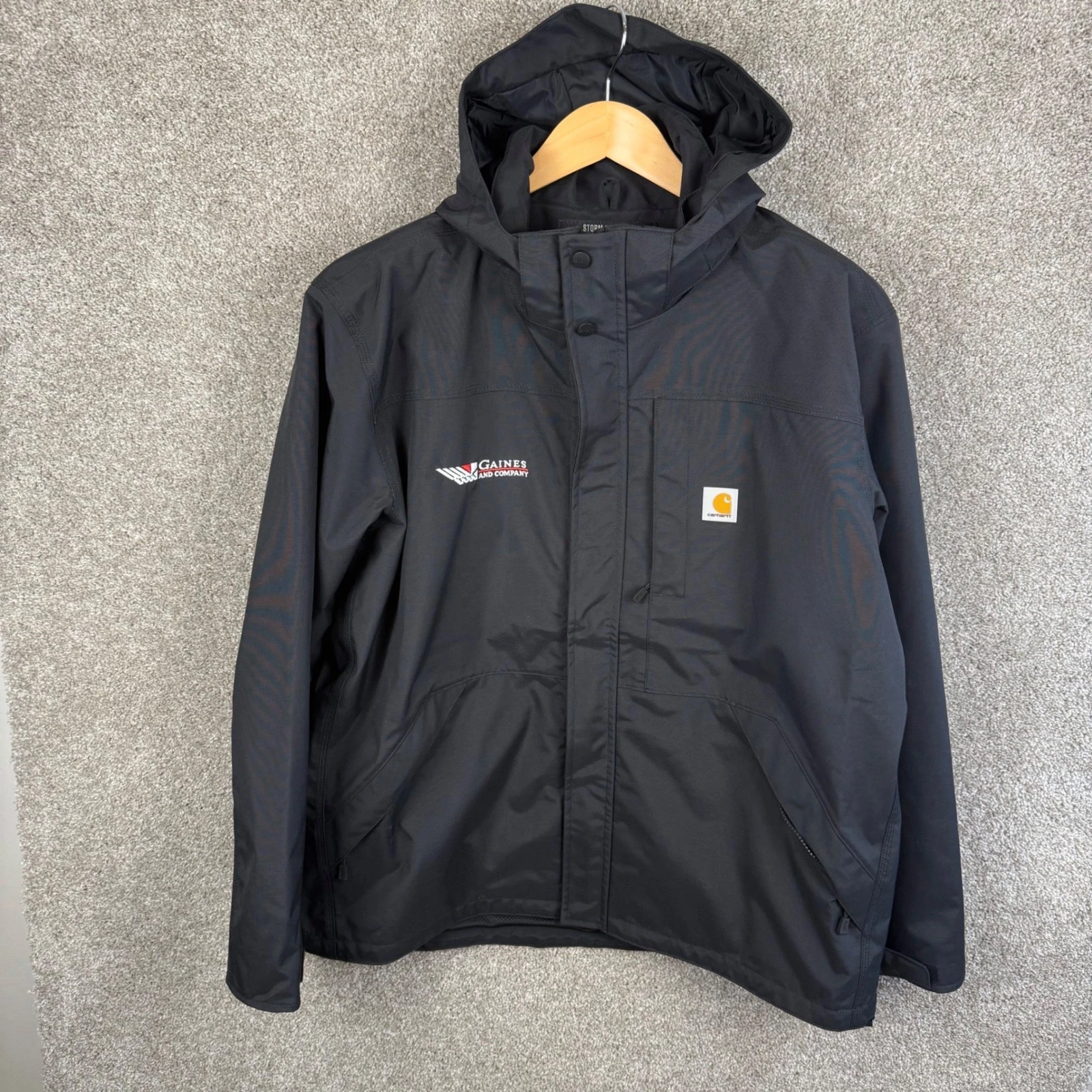 Carhartt Storm Defender Jacket Mens XL Black Loose Fit Hooded Work Coat LOGO