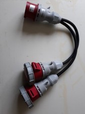 32amp 3-phase plug to twin 32amp sockets.
