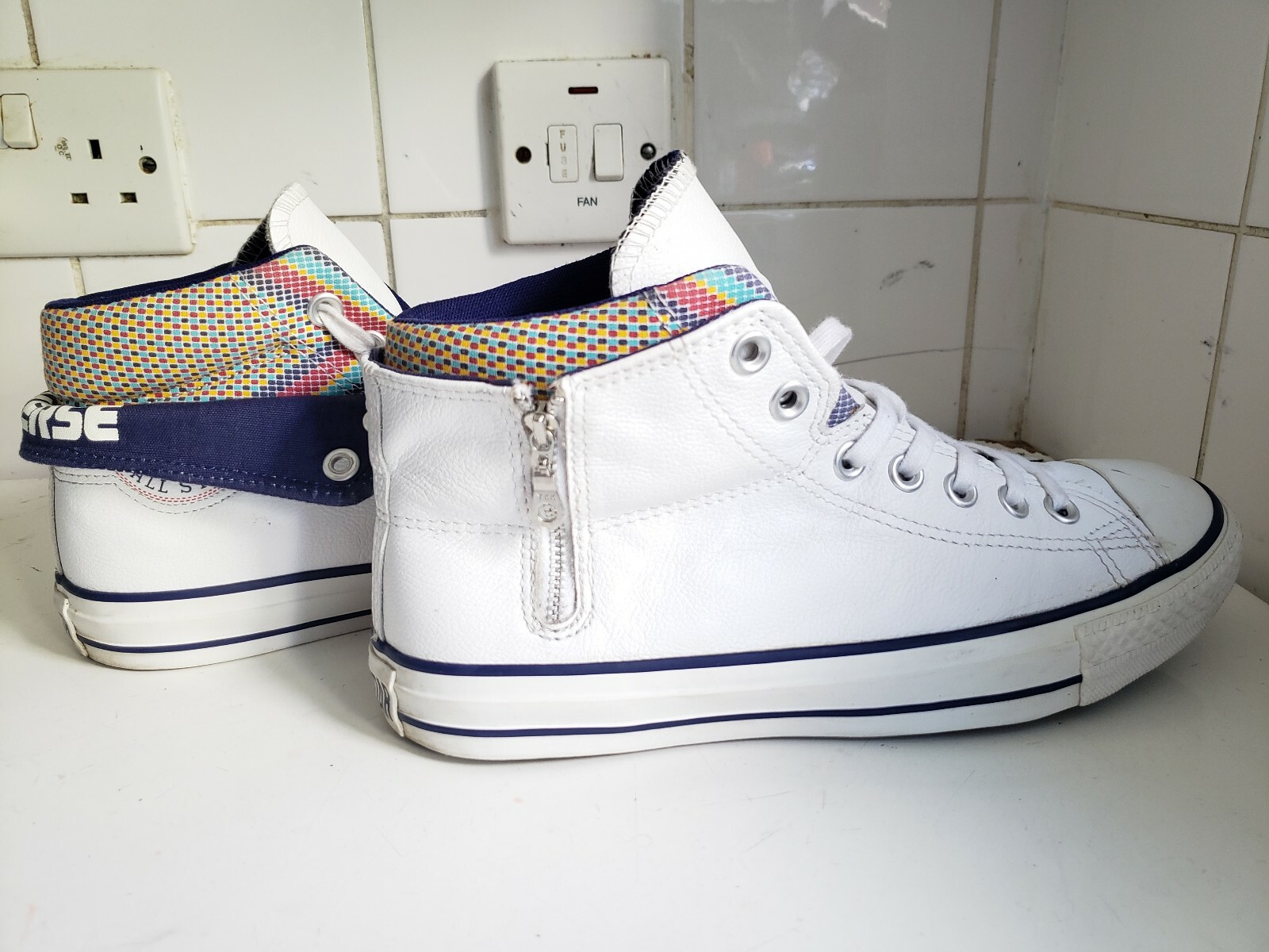 white trainers with star on side