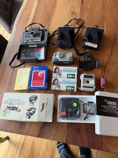 Collection Of Vintage Polaroid Camera And Accessories