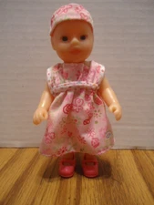 Vtg. Zapf Miniworld Baby Born 5" toddler doll w/ Pink flowered dress