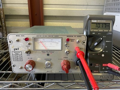 POWER DESIGNS INC MODEL 6010 0-60 V @ 0.5A , 1.5A @ 20V UNIVERSAL DC SOURCE