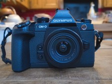 Olympus OM-D E-M1 Camera Body Mark 1.  Near mint. With Lumix 12-32mm Lens