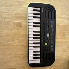 Casio SA-46 32-Key Electronic Keyboard, Black/Green, Battery Powered, Beginner
