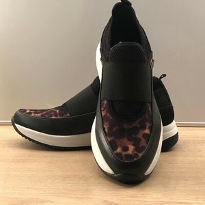 ak sport leopard slip on sneakers