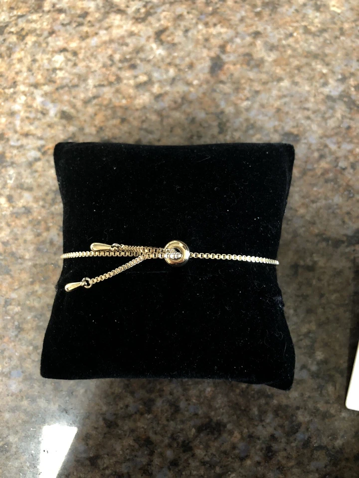 Juego de pendientes y brazaletes Banana Republic bronce estrás Foto 4 de 4