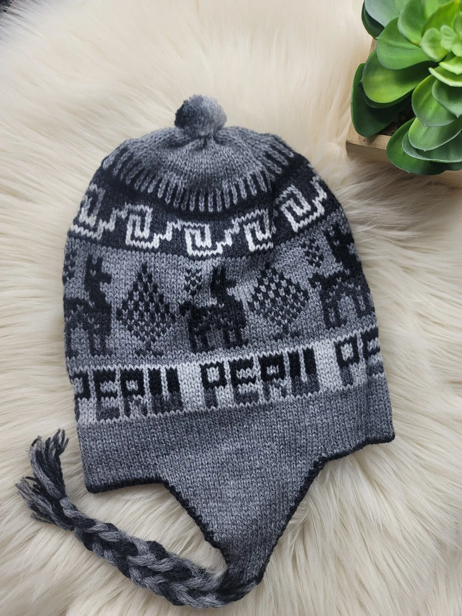 Donna peruviana filatura lana con cappello ricamato tradizionale, Colca