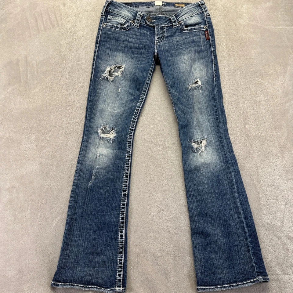 Pantalones de mezclilla plateados para mujer 27 Tuesday corte bota desgastados bigotes lavado medio Foto 2 de 4