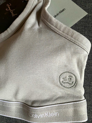 Calvin Klein x Jung Kook Damen Sport-BH ohne Bügel Baumwolle Grau Gr. L
