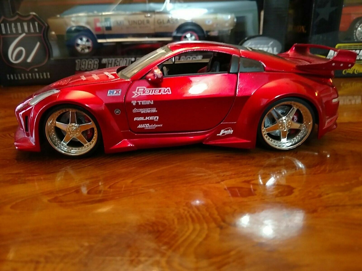Jada Toys Nissan Z Import Racer 1:24 DieCast Candy Apple Red Jada Toys Nissan Z Import Racer 1:24 DieCast Candy Apple Red