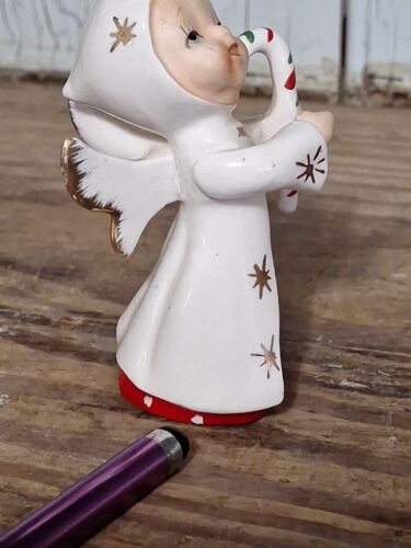 FIGURINA ANGELO DI NATALE NAPCO VINTAGE CHE TIENE CARAMELLE ORO STARBURST riparata - Foto 9 di 13
