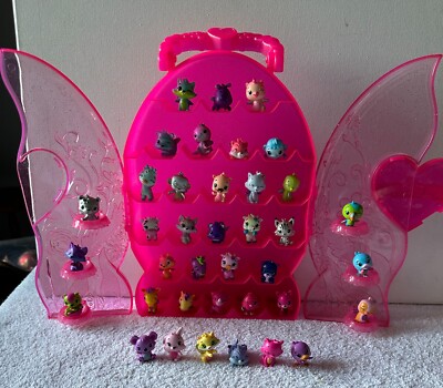 Hatchimals Colleggtibles Lot of 39 Figures in Pink Carry Case Spin Master
