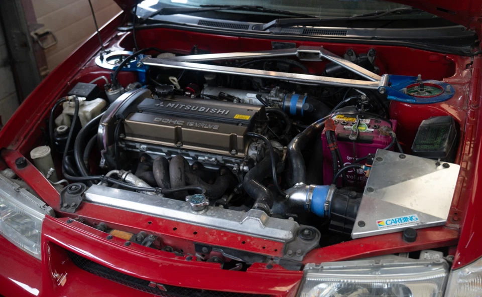 Reubicación de batería de caja de aire Mitsubishi Lancer Evolution CP9A Carbing JDM 70 mm Foto 2 de 4