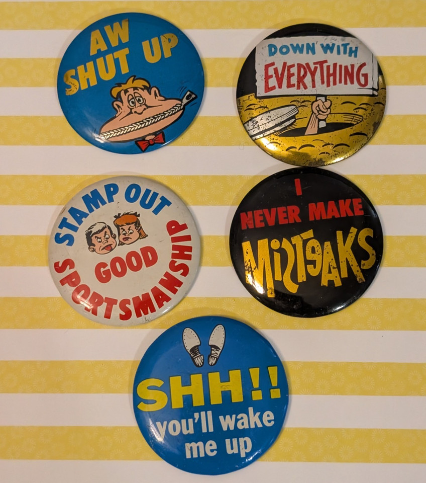 A genuine lot of 1960s Made-in-Japan novelty pinback buttons dripping with kitschy cartoon rude humor — wearable time capsules of mid-century irreverence.