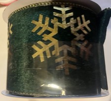 3 1/2 x 20 Ft wired edge ribbon. Dark Green With Large Gold Snowflake
