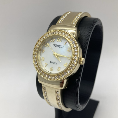 Working Women s Gold Tone Sparkle Bezel Mother Of Pearl Gossip Bangle Watch