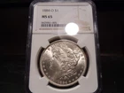1884-O MS65 Morgan Silver Dollar NGC Certified Gem - White/Faint Gold Hue