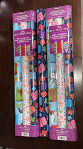 7 Unopened Rolls of Reversible Christmas Wrapping Paper (270 sq ft each)