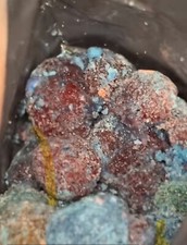 Blueberry sour candy gushers , other flavors , sweet candy turned sour