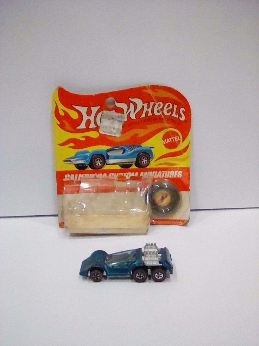 Hot Wheels 1970 Vintage Redline Six Shooter ( WITH card and button