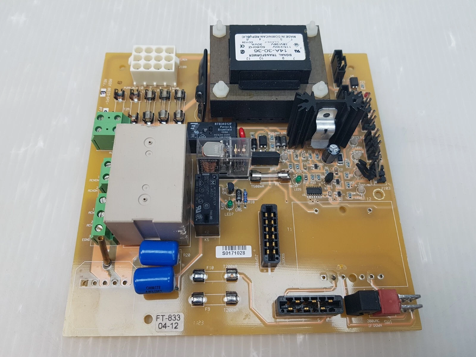 0633-641-01 Rev E board rotated, with the T1 area empty and relays near the heat sink