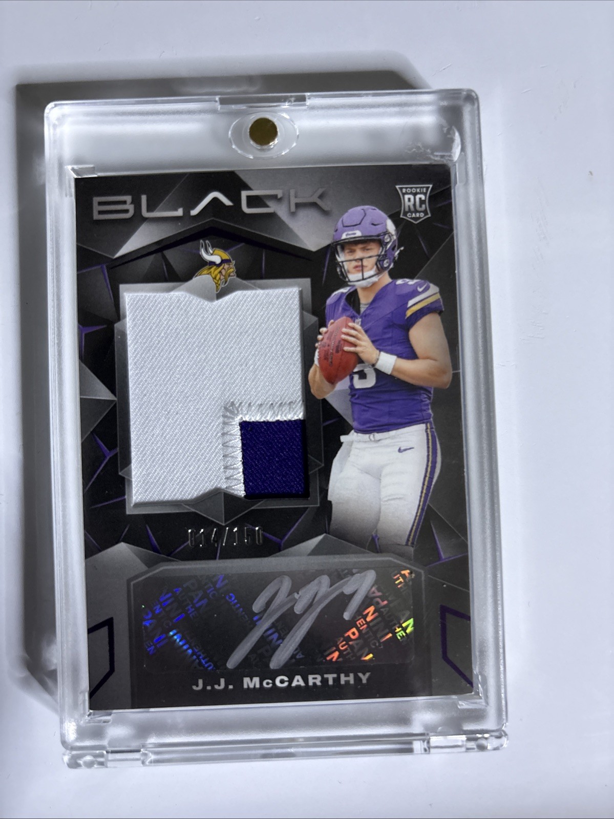 2024 Panini Black - Rookie Patch Autograph JJ McCarthy #202 Royal /150 (AU,...