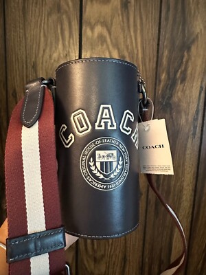 NWT Coach Water Bottle Crossbody with Varsity Motif Leather with Strap