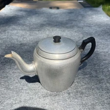 TEAPOT SONA WARE J.2004 NCJLTD THE ALUMINIUM WORKS STRATFORD-ON-AVON ENGLAND